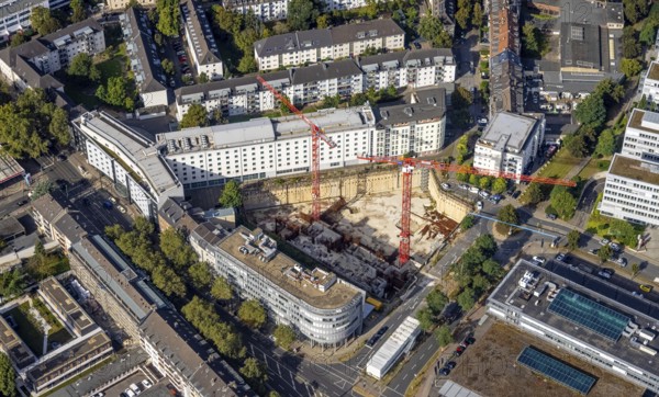 Aerial view, construction site on Mercedesstraße with new construction of an office and residential complex in the Düsseltal district of Düsseldorf, Rhineland, North Rhine-Westphalia, Germany, construction work, construction, construction area, building site, building plots, construction crane, construction project, construction site, CG Gruppe AG, DE, Düsseldorf, development, Europe, commercial buildings, property tax, real estate, capacity requirements, aerial photograph, aerial photography, aerial photography, new construction, overview, bird's-eye view, residential complex, living and working, residential area, residential buildings, birds-eyes view, overview