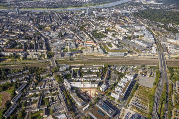 Aerial view, construction site on Mercedesstraße with new construction of an office and residential complex in the Düsseltal district of Düsseldorf, Rhineland, North Rhine-Westphalia, Germany, construction work, construction, construction area, building site, building plots, construction crane, construction project, construction site, CG Gruppe AG, DE, Düsseldorf, development, Europe, commercial buildings, property tax, university, real estate, capacity requirements, aerial photograph, aerial photography, aerial photography, new construction, overview, bird's-eye view, residential complex, living and working, residential area, residential buildings, birds-eyes view, overview