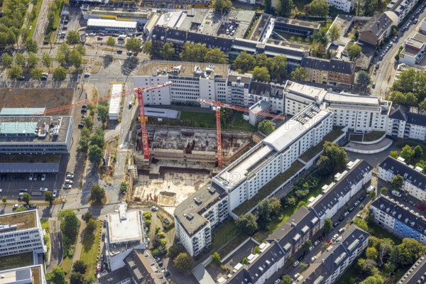 Aerial view, construction site on Mercedesstraße with new construction of an office and residential complex in the Düsseltal district of Düsseldorf, Rhineland, North Rhine-Westphalia, Germany, construction work, construction, construction area, construction site, building plots, construction crane, construction project, construction site, CG Gruppe AG, DE, Düsseldorf, development, Europe, commercial buildings, property tax, high-rise buildings, real estate, capacity requirements, aerial view, aerial photography, aerial photography, new construction, overview, bird's-eye view, residential complex, living and working, residential area, residential buildings, birds-eyes view, overview