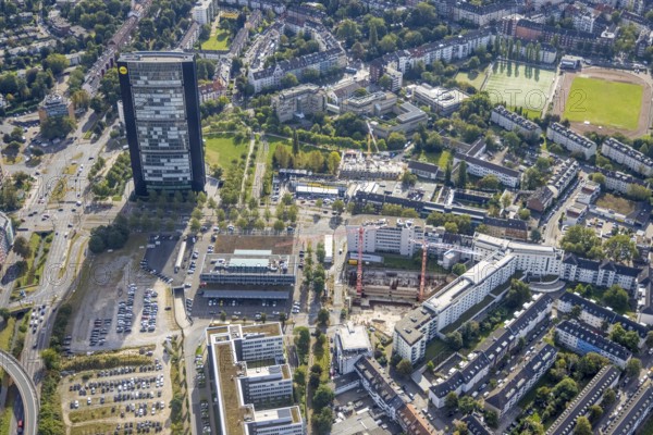 Aerial view, ARAG Tower with construction site on Mercedesstraße with new construction of an office and residential complex in the Düsseltal district of Düsseldorf, Rhineland, North Rhine-Westphalia, Germany, ARAG high-rise building, construction work, construction, construction area, construction site, building plots, construction crane, construction measure, construction project, construction site, CG Gruppe AG, DE, Düsseldorf, development, Europe, commercial buildings, property tax, high-rise buildings, real estate, capacity requirements, aerial view, aerial photography, aerial photography, new construction, overview, bird's-eye view, residential complex, living and working, residential area, residential buildings, birds-eyes view, overview