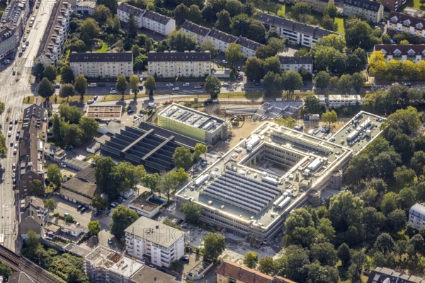 Aerial view, construction site at Friedrich-Rückert-Gymnasium and Weiterbildungskolleg with evening school in the Rath district of Düsseldorf, Rhineland, North Rhine-Westphalia, Germany, construction work, construction area, construction site, construction measure, construction project, construction site, education, educational institution, DE, Düsseldorf, Europe, educational institute, aerial view, aerial photography, aerial photography, school, overview, bird's-eye view, overview