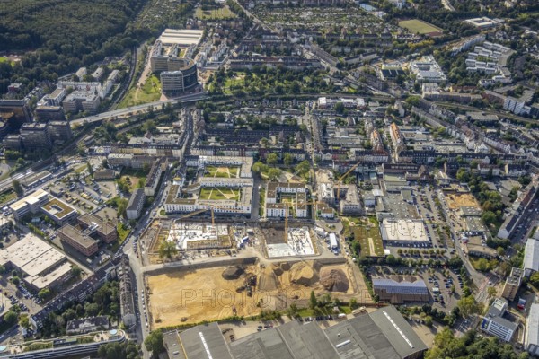 Aerial view, construction site and new building flats Am Gatherhof at the former premises of the company Paguag and the Rather Carree in the district Rath in Düsseldorf, Rhineland, North Rhine-Westphalia, Germany, construction work, construction area, construction site, building plots, construction project, construction site, DE, Düsseldorf, shopping square, shopping centre, Europe, aerial view, aerial photography, aerial photography, Rather Carré, shopping centre, overview, bird's eye view, birds-eyes view, overview