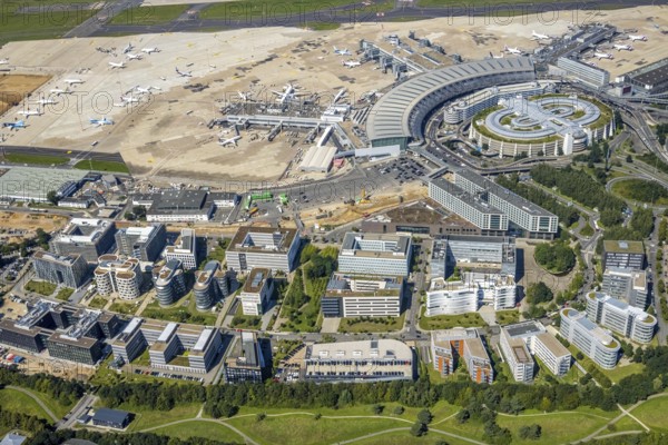 Aerial view, Düsseldorf Airport and Air Park business centre in the Lohausen district of Düsseldorf, Rhineland, North Rhine-Westphalia, Germany, terminal building, DE, Düsseldorf, Düsseldorf Airport, reception building, Europe, flight mission, airport, aircraft noise, airfield, aircraft, commercial buildings, aerial photograph, aerial photography, aerial photography, overview, bird's-eye view, overview
