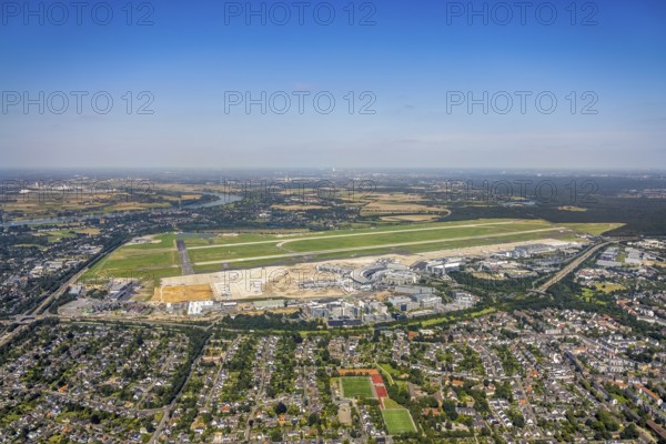 Aerial photograph, Düsseldorf Airport in the Lohausen district of Düsseldorf, Rhineland, North Rhine-Westphalia, Germany, terminal building, DE, Düsseldorf, Düsseldorf Airport, reception building, Europe, flight emission, airport, aircraft noise, airfield, aeroplane, aerial photograph, aerial photography, aerial photography, overview, bird's-eye view, bird's-eye view, overview