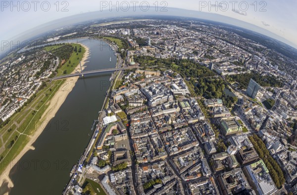 Aerial view, fisheye view of the river Rhine and Oberkasseler bridge in the Carlstadt district of Düsseldorf, Rhineland, North Rhine-Westphalia, Germany, DE, Düsseldorf, Europe, fisheye view, aerial view, aerial photography, aerial photography, overview, bird's-eye view, bird's-eye view, fisheye lens, overview