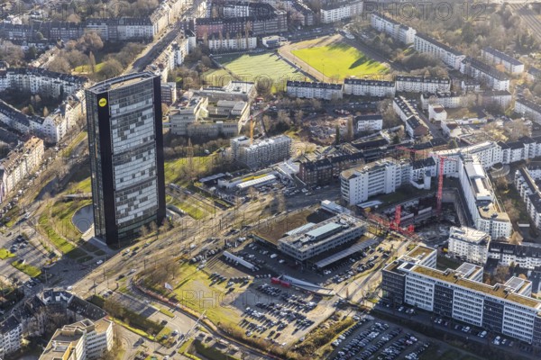 Aerial view, ARAG Tower with construction site at the corner of Mercedesstraße and Münsterstraße with new construction of an office and residential complex in the Düsseltal district of Düsseldorf, Rhineland, North Rhine-Westphalia, Germany, ARAG high-rise building, construction work, construction, construction area, construction site, building plots, construction crane, construction measure, construction project, construction site, CG Gruppe AG, DE, Düsseldorf, development, Europe, commercial buildings, property tax, high-rise buildings, real estate, capacity requirements, aerial view, aerial photography, aerial photography, new construction, overview, bird's-eye view, residential complex, living and working, residential area, residential buildings, birds-eyes view, overview