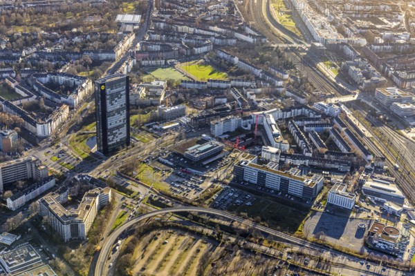 Aerial view, ARAG Tower with construction site at the corner of Mercedesstraße and Münsterstraße with new construction of an office and residential complex in the Düsseltal district of Düsseldorf, Rhineland, North Rhine-Westphalia, Germany, ARAG high-rise building, construction work, construction, construction area, construction site, building plots, construction crane, construction measure, construction project, construction site, CG Gruppe AG, DE, Düsseldorf, development, Europe, commercial buildings, property tax, high-rise buildings, real estate, capacity requirements, aerial view, aerial photography, aerial photography, new construction, overview, bird's-eye view, residential complex, living and working, residential area, residential buildings, birds-eyes view, overview