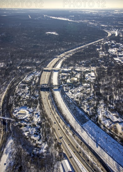 Aerial view, pedestrian bridge and green bridge at the zoo over the A3 motorway, Duissern, Duisburg, Ruhr area, North Rhine-Westphalia, Germany, motorway, bridge, DE, Europe, pedestrian bridge, green bridge, aerial view, aerial photography, aerial photography, snow, overview, bird's eye view, wildlife bridge, winter, birds-eyes view, cleared roads, overview