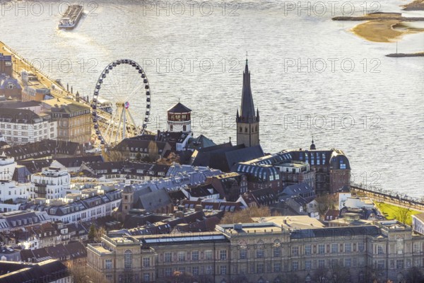 Aerial view, Wheel of Vision Ferris wheel at Burgplatz at Christmas time in the Old Town in Düsseldorf, Rhineland, North Rhine-Westphalia, Germany, place of worship, DE, Düsseldorf, Europe, religious community, place of worship, holy place, church, parish, denomination, aerial view, aerial photography, aerial photography, religion, religious site, St. Lambertus Church St. Lambertus Church, overview, bird's eye view, birds-eyes view, catholic St. Lambertus Church, overview