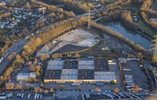 Aerial view, construction site between Am Rhein-Herne-Kanal and Borbecker Straße as well as Spedition Mickeleit GmbH in the district Ebel in Bottrop, Ruhr area, North Rhine-Westphalia, Germany, construction work, construction area, building site, building plots, construction project, construction site, Bottrop, DE, Europe, commercial enterprises, commercial area, commercial area, commercial site, commercial use, industrial area, industrial site, aerial view, aerial photography, aerial photography, Rhine-Herne Canal, overview, bird's-eye view, birds-eyes view, overview