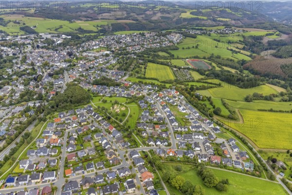Aerial view, housing estate with playground on Frankfurter Straße in Breckerfeld, Sauerland, North Rhine-Westphalia, Germany, Breckerfeld, DE, Europe, property tax, real estate, aerial view, aerial photography, aerial photography, overview, bird's-eye view, housing estate, housing and living, residential area, residential buildings, housing quality, residential neighbourhood, housing estate, birds-eyes view, overview