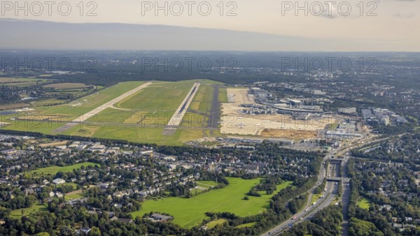 Aerial photo, Düsseldorf Airport in the Lohausen district of Düsseldorf, Rhineland, North Rhine-Westphalia, Germany, DE, Düsseldorf, Europe, flight emission, airport, aircraft noise, aerodrome, aerial photograph, aerial photography, aerial photography, overview, bird's-eye view, overview