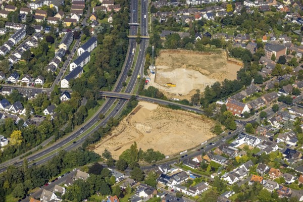 Aerial view, construction site after demolition of fashion houses on Danziger Straße for planned new construction of residential buildings in the Stockum district of Düsseldorf, Rhineland, North Rhine-Westphalia, Germany, construction work, construction area, building site, building plots, construction project, construction site, DE, Düsseldorf, Europe, aerial view, aerial photography, aerial photography, new construction, overview, bird's eye view, birds-eyes view, overview