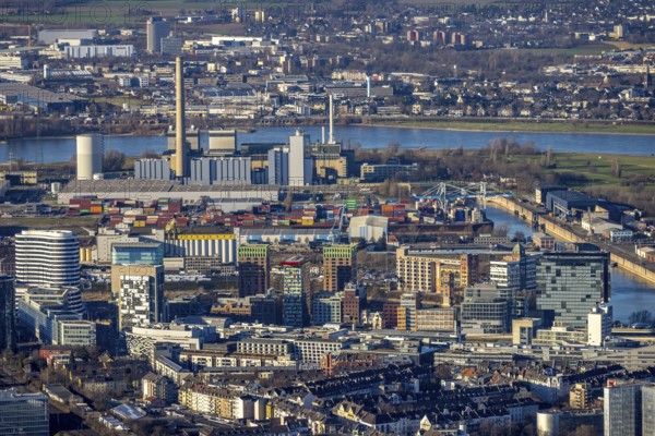 Aerial view, Medienhafen with the Lausward power plant in the harbour district of Düsseldorf, Rhineland, North Rhine-Westphalia, Germany, DE, Düsseldorf, Europe, commercial enterprises, commercial area, commercial park, commercial location, commercial use, industrial area, industrial location, power plant, aerial photograph, aerial photography, aerial photography, overview, bird's-eye view, overview