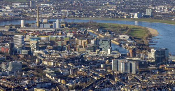 Aerial view, Medienhafen with the Lausward power plant in the harbour district of Düsseldorf, Rhineland, North Rhine-Westphalia, Germany, DE, Düsseldorf, Europe, commercial enterprises, commercial area, commercial park, commercial location, commercial use, industrial area, industrial location, power plant, aerial photograph, aerial photography, aerial photography, overview, bird's-eye view, overview