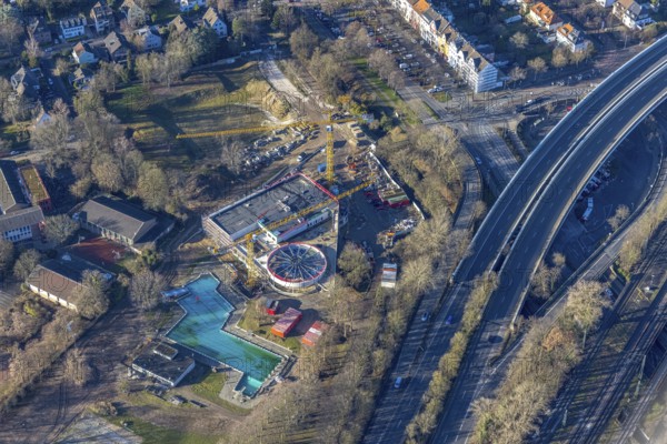 Aerial view, outdoor swimming pool Benrath with construction site and new building indoor swimming pool Benrath in the district Benrath in Düsseldorf, Rhineland, North Rhine-Westphalia, Germany, bathing establishment, bathing resort, bathing fun, construction work, construction area, building site, building plots, construction project, construction site, DE, Düsseldorf, Europe, outdoor swimming pool, leisure activities, indoor swimming pool, aerial view, aerial photography, aerial photography, new building, swimming pool, overview, bird's eye view, birds-eyes view, overview
