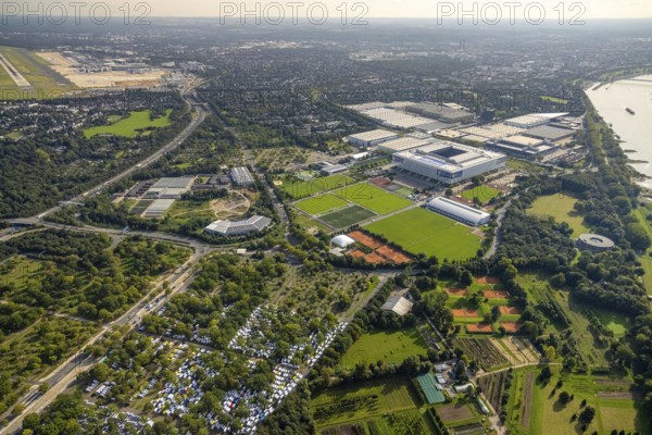 Aerial view, Caravan Center Campsite at the fairground and Messe Düsseldorf with the Bundesliga stadium MERKUR SPIEL-ARENA in the Stockum district of Düsseldorf, Rhineland, North Rhine-Westphalia, Germany, camping, camping facility, camping mobile, campsite, DE, Düsseldorf, Europe, shapes and colours, leisure, hobby, aerial view, aerial photography, aerial photography, overview, bird's-eye view, motorhome, birds-eyes view, overview