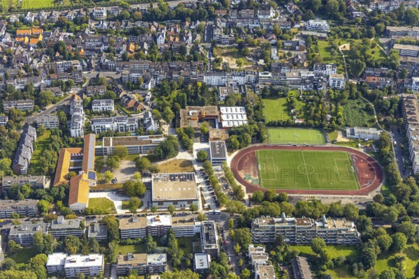 Aerial view, Cecilien-Gymnasium Düsseldorf and Carl-Benz-Realschule with sports field in the district Niederkassel in Düsseldorf, Rhineland, North Rhine-Westphalia, Germany, education, educational institution, DE, Düsseldorf, Europe, football pitch, grammar school, educational institute, aerial view, aerial photography, aerial photography, secondary school, school, sports, sports facilities, sports field, sports facility, overview, bird's-eye view, birds-eyes view, overview