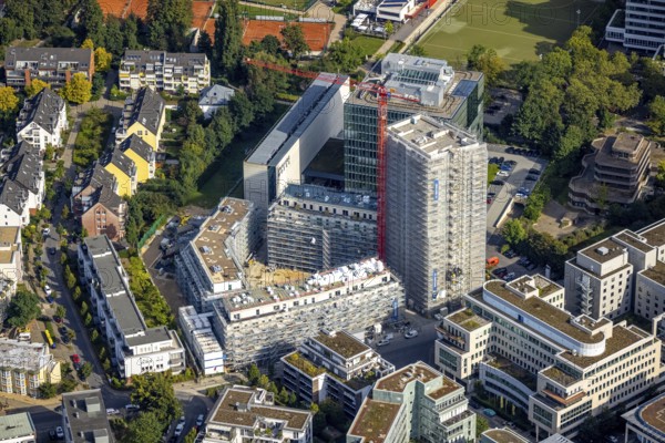 Aerial view, construction site at the Seestern Quartier with new construction of a high-rise residential building at Niederkasseler Lohweg in the district Lörick in Düsseldorf, Rhineland, North Rhine-Westphalia, Germany, construction work, construction area, construction site, building plots, construction project, construction site, DE, Düsseldorf, Europe, property tax, high-rise building, real estate, aerial view, aerial photography, aerial photography, new construction, overview, bird's eye view, residential complex, living and living, residential area, residential buildings, residential quarter, birds-eyes view, overview