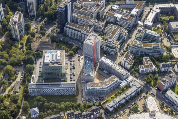 Aerial view, construction site at the Seestern Quartier with new construction of a high-rise residential building at Niederkasseler Lohweg in the district Lörick in Düsseldorf, Rhineland, North Rhine-Westphalia, Germany, construction work, construction area, construction site, building plots, construction project, construction site, DE, Düsseldorf, Europe, property tax, high-rise building, real estate, aerial view, aerial photography, aerial photography, new construction, overview, bird's eye view, residential complex, living and living, residential area, residential buildings, residential quarter, birds-eyes view, overview