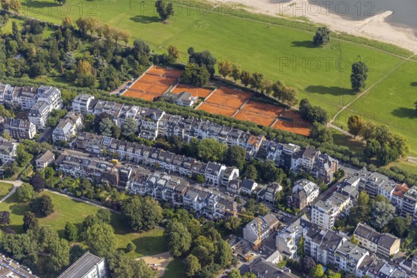 Aerial view, residential complex and tennis courts Tennis-Club Düsseldorf Grün-Weiß at Kaiser-Friedrich-Ring in the district Niederkassel in Düsseldorf, Rhineland, North Rhine-Westphalia, Germany, DE, Düsseldorf, Europe, property tax, real estate, aerial view, aerial photography, aerial photography, sports, tennis, tennis facility, tennis courts, overview, bird's eye view, residential complex, housing and living, residential area, residential buildings, quality of living, residential neighbourhood, housing estate, birds-eyes view, overview