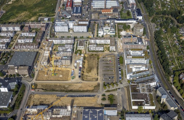 Aerial view, construction site at the VIERZIG549 residential complex in the Büderich district of Meerbusch, Rhineland, North Rhine-Westphalia, Germany, construction work, construction area, building site, building plots, construction project, construction site, DE, Düsseldorf, Europe, shapes and colours, property tax, real estate, aerial view, aerial photography, aerial photography, Meerbusch, new construction, overview, bird's-eye view, housing estate, residential area, residential buildings, residential quality, residential neighbourhood, housing estate, birds-eyes view, overview