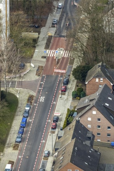 Aerial view, residential area shopping street construction site Schneiderstraße, new pedestrian crossing, Bottrop-Kirchhellen, Ruhr area, North Rhine-Westphalia, Germany, construction work, construction vehicles, construction site, construction measure, construction site, DE, renewal, Europe, aerial view, aerial photography, aerial photography, renovation, overview, bird's eye view, zebra crossing, birds-eyes view, overview