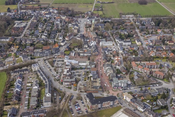 Aerial view, construction site new building project Kirchhellener arcades at Schulstraße at Alter Markt, corner Kirchstraße, St. Johannes Kirche Hauptstraße, Bottrop-Kirchhellen, Ruhr area, North Rhine-Westphalia, Germany, construction work, construction area, construction site, building plots, construction project, construction site, DE, shopping street, Europe, property tax, Hans Büning Platz, real estate, aerial view, aerial photography, aerial photography, new construction, overview, bird's eye view, living and life, residential area, residential buildings, birds-eyes view, overview