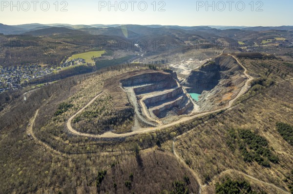 Aerial view, Bilstein quarry, Westdeutsche Grauwacke-Union, Brilon, Sauerland, North Rhine-Westphalia, Germany, Bergisch-Westerwälder Hartsteinwerke, Bilsteinhalde, DE, Europe, distant view, Hochsauerlandkreis, aerial view, aerial photography, aerial photography, quarry, overview, bird's-eye view, branch office of Basalt AG, birds-eyes view, overview