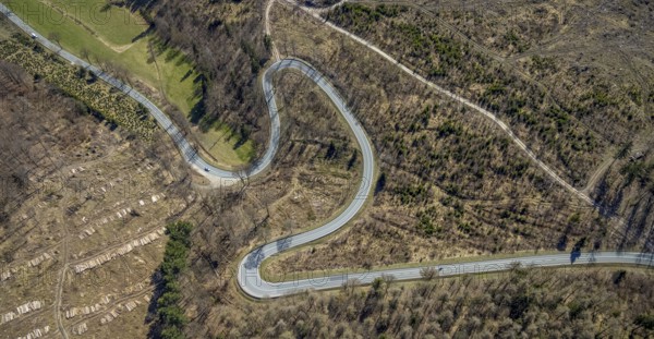 Aerial view, Bilsteinhalde, serpentines, forest dieback, hairpin bend, motorbike route, Gudenhagen, Brilon, Sauerland, North Rhine-Westphalia, Germany, DE, Europe, aerial view, aerial photography, aerial photography, road traffic, overview, bird's-eye view, forest, forest area, forest damage, birds-eyes view, overview