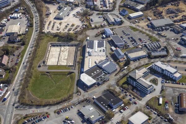 Aerial view, commercial area Ostring, industrial electronics Brilon, tax office Brilon, Brilon, Sauerland, North Rhine-Westphalia, Germany, authority, DE, Europe, commercial enterprises, commercial area, commercial location, commercial use, industrial area, industrial location, aerial photograph, aerial photography, aerial photography, photovoltaic, photovoltaic system, solar, solar system, solar energy, solar energy, overview, bird's-eye view, birds-eyes view, overview