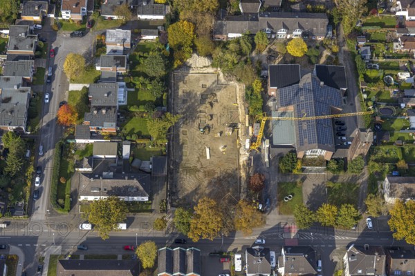 Aerial view, construction site at the former church St. Elisabeth with solar roof in the north-east district of Bottrop, Ruhr area, North Rhine-Westphalia, Germany, place of worship, construction work, construction area, building site, building plots, construction crane, construction project, construction site, Bottrop, DE, Europe, religious community, place of worship, holy place, church, parish, denomination, aerial view, aerial photography, aerial photography, religion, religious site, overview, bird's-eye view, overview