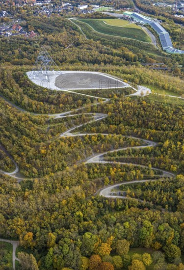 Aerial view, tetrahedron pyramid and serpentine path on the Beckstraße slag heap in the Batenbrock-Nord district of Bottrop, Ruhr area, North Rhine-Westphalia, Germany, viewing terrace, Bottrop, DE, Europe, shapes and colours, Emscherblick slag heap event, autumn forest colours, aerial view, aerial photography, aerial photography, pyramid sculpture, sight, serpentine shape, tetrahedron, overview, bird's eye view, forest area, birds-eyes view, overview, zigzag