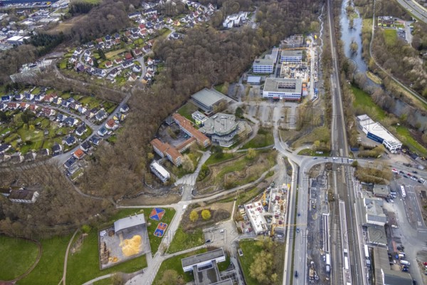 Aerial view, construction site and new building, vocational training centre on the educational campus on Kleinbahnstraße, Franz-Stock-Gymnasium, cultural centre, Berufskolleg Berliner Platz, Hüsten, Arnsberg, Sauerland, North Rhine-Westphalia, Germany, construction work, construction area, building site, building plots, construction measure, construction project, construction site, education, educational institution, DE, Europe, grammar school, teaching institute, aerial view, aerial photography, aerial photography, new building, school, overview, bird's eye view, overview