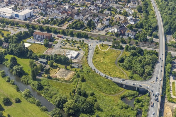 Aerial view, construction site and new construction of the Hagelstein rescue station next to the Arnsberg police station - Police Station West, Hüsten, Arnsberg, Sauerland, North Rhine-Westphalia, Germany, eye of the law, construction work, construction area, construction site, building plots, construction project, construction project, construction site, DE, Europe, Hochsauerlandkreis, aerial view, aerial photography, aerial photography, new building, law enforcement officer, police, police station, police station, rescue station, state authority, state power, overview, bird's-eye view, overview