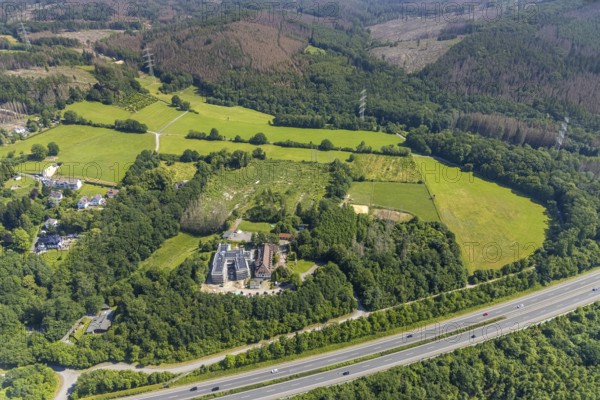 Aerial view, construction site and new building for the children's home Marienfrieden, SkF Hochsauerland Sozialdienst kath. Frauen e.V., Hüsten, Arnsberg, Sauerland, North Rhine-Westphalia, Germany, construction work, construction area, building site, building plots, construction project, construction site, DE, Europe, Haus Marienfrieden, Hochsauerlandkreis, children's home, aerial photograph, aerial photography, aerial photography, new building, photovoltaics, photovoltaic system, SkF Hochsauerland, solar, solar system, solar energy, solar energy, overview, bird's-eye view, birds-eyes view, overview
