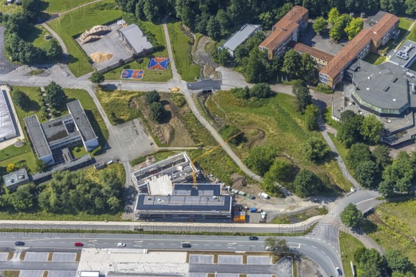 Aerial photo, construction site, new building, extension of Hochsauerlandkreis vocational college, Hüsten, Arnsberg, Sauerland, North Rhine-Westphalia, Germany, construction work, construction site, building plots, construction project, building site, education, educational institution, DE, Europe, Hochsauerlandkreis, college, educational institute, aerial photograph, aerial photography, aerial photography, new building, school, overview, bird's-eye view, overview