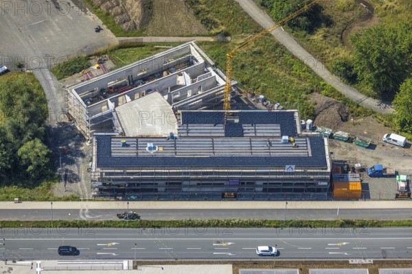 Aerial photo, construction site, new building, extension of Hochsauerlandkreis vocational college, Hüsten, Arnsberg, Sauerland, North Rhine-Westphalia, Germany, construction work, construction site, building plots, construction project, building site, education, educational institution, DE, Europe, Hochsauerlandkreis, college, educational institute, aerial photograph, aerial photography, aerial photography, new building, school, overview, bird's-eye view, overview