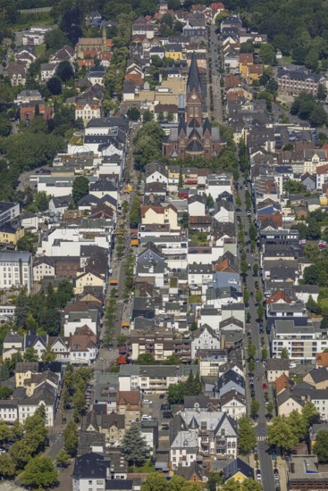 Aerial view, Cathedral of Neheim St. Johannes-Baptist, pedestrian zone Hauptstraße, Apothekerstraße, Neheim, Arnsberg, Sauerland, North Rhine-Westphalia, Germany, place of worship, DE, cathedral, shopping mall, shopping mile, shopping centre, Europe, pedestrian zone, religious community, place of worship, sacred site, Hochsauerlandkreis, church, parish, denomination, aerial view, aerial photography, aerial photography, religion, religious site, shopping, overview, bird's-eye view, overview