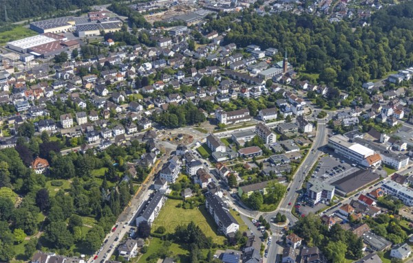 Aerial view, oval roundabout Alter Holzweg and Graf-Gottfried-Straße, construction site Pfarrer-Leo-Reiners-Platz for new roundabout, formerly Ehmsenplatz, catholic church St. Michael, roundabout Michaelstraße and Graf-Gottfried-Straße, Neheim, Arnsberg, Sauerland, North Rhine-Westphalia, Germany, place of worship, DE, Europe, religious community, place of worship, green space, holy place, Hochsauerlandkreis, church, parish, denomination, roundabout, roundabout, aerial view, aerial photography, aerial photography, religion, religious site, road traffic, overview, bird's-eye view, overview