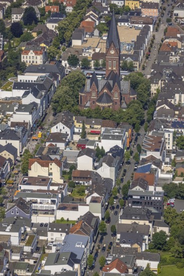 Aerial view, Cathedral of Neheim St. Johannes-Baptist, pedestrian zone Hauptstraße, Apothekerstraße, Neheim, Arnsberg, Sauerland, North Rhine-Westphalia, Germany, place of worship, DE, cathedral, shopping mall, shopping mile, shopping centre, Europe, pedestrian zone, religious community, place of worship, sacred site, Hochsauerlandkreis, church, parish, denomination, aerial view, aerial photography, aerial photography, religion, religious site, shopping, overview, bird's-eye view, overview