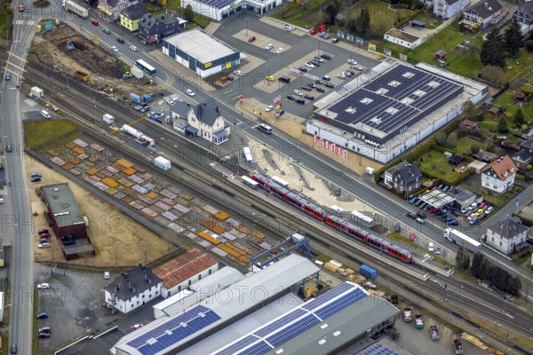 Aerial view, Bad Laasphe railway station, Siegerland, North Rhine-Westphalia, Germany, Bad Laasphe, railway tracks, railway station, DE, DTB Dachtechnik Briel, Deutsche Bahn AG, Europe, railway tracks, main railway station, main station, aerial view, aerial photography, aerial photography, metal processing company, Rewe supermarket, Slawinski & Co. GmbH, overview, bird's-eye view, birds-eyes view, overview