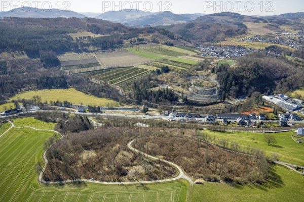 Aerial view, slate mine Nuttlar, visitor mine slate mine Nuttlar, slag heap former Ostwig mine, Nuttlar, Bestwig, Sauerland, North Rhine-Westphalia, Germany, federal road B7, DE, Europe, distant view, slag heap, hilly landscape, aerial view, aerial photography, aerial photography, overview, bird's eye view, forest area, meadows and fields, birds-eyes view, historic slate mine, overview