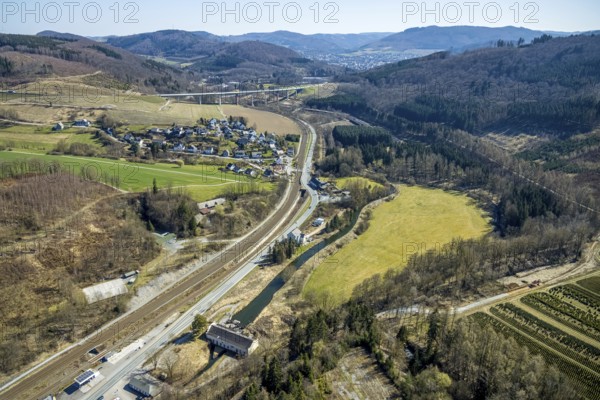 Aerial view, federal road B7, river Ruhr, hydroelectric power station Nuttlar, district Dümel, Ruhr valley bridge Bermecke, Nuttlar, Bestwig, Sauerland, North Rhine-Westphalia, Germany, motorway bridge, railway tracks, bridge, federal road B480n, DE, Europe, hilly landscape, aerial view, aerial photography, aerial photography, overview, bird's-eye view, forest area, birds-eyes view, overview