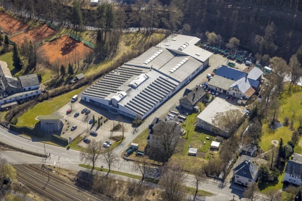 Aerial view, company building Ramspott GmbH, solar roof, Nuttlar, Bestwig, Sauerland, North Rhine-Westphalia, Germany, DE, Europe, commercial enterprises, commercial area, commercial location, commercial use, aerial view, aerial photography, aerial photography, photovoltaics, photovoltaic system, solar, solar system, solar energy, solar energy, sports, tennis, tennis facility, tennis courts, overview, bird's-eye view, overview