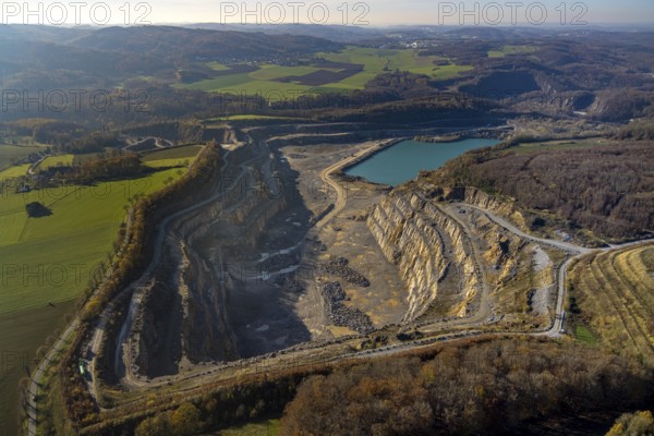 Aerial photograph, Asbeck quarry and the Blaue Lagune quarry lake in the Eisborn district of Balve, Sauerland, North Rhine-Westphalia, Germany, Balve, DE, Europe, quarry lake, limestone quarry, limestone extraction, aerial photograph, aerial photography, aerial photography, quarry, Hönnetal quarry, overview, bird's-eye view, overview
