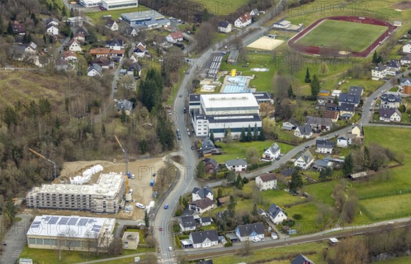 Aerial view, Wabach stadium, Wabach pool, construction site and new construction of a senior citizens' residence on the former main school grounds, Bad Laasphe, Siegerland, North Rhine-Westphalia, Germany, retirement home, old people's home, old people's home, bathing establishment, bathing resort, care and nursing, DE, Europe, outdoor pool, leisure activities, football pitch, football stadium, aerial view, aerial photography, aerial photography, care facility, swimming pool, swimming pool, retirement home, retirement residence, retirement home, retirement centre, sports, sports facilities, sports field, sports facility, overview, bird's eye view, birds-eyes view, overview