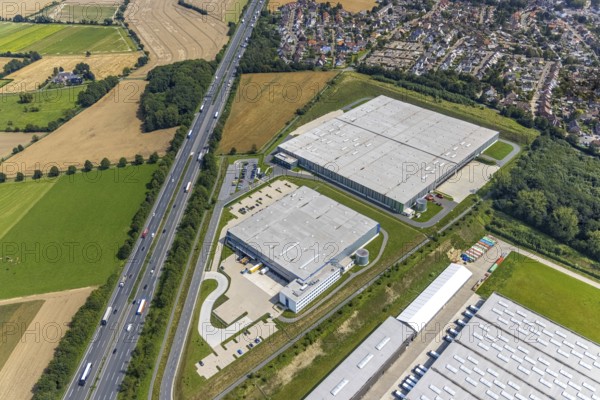 Aerial view, commercial area Lünener Straße at the motorway A2, Heldt Gebäudetechnik and DHL Ernst-von-Bodelschwingh-Street in Weddinghofen, Bergkamen, Ruhr area, North Rhine-Westphalia, Germany, DE, DHL Logistik, Europe, commercial enterprises, commercial area, commercial park, commercial location, commercial use, industrial area, industrial building, industrial location, aerial photograph, aerial photography, aerial photography, overview, bird's-eye view, birds-eyes view, overview