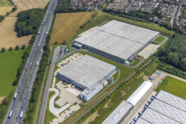 Aerial view, commercial area Lünener Straße at the motorway A2, Heldt Gebäudetechnik and DHL Ernst-von-Bodelschwingh-Street in Weddinghofen, Bergkamen, Ruhr area, North Rhine-Westphalia, Germany, DE, DHL Logistik, Europe, commercial enterprises, commercial area, commercial park, commercial location, commercial use, industrial area, industrial building, industrial location, aerial photograph, aerial photography, aerial photography, overview, bird's-eye view, birds-eyes view, overview