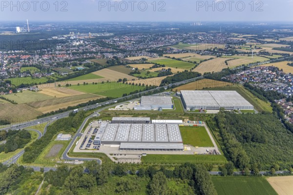 Aerial view, commercial area Lünener Straße at the motorway A2, Heldt Gebäudetechnik and DHL Ernst-von-Bodelschwingh-Street in Weddinghofen, Bergkamen, Ruhr area, North Rhine-Westphalia, Germany, DE, DHL Logistik, Europe, commercial enterprises, commercial area, commercial park, commercial location, commercial use, industrial area, industrial building, industrial location, aerial photograph, aerial photography, aerial photography, overview, bird's-eye view, birds-eyes view, overview